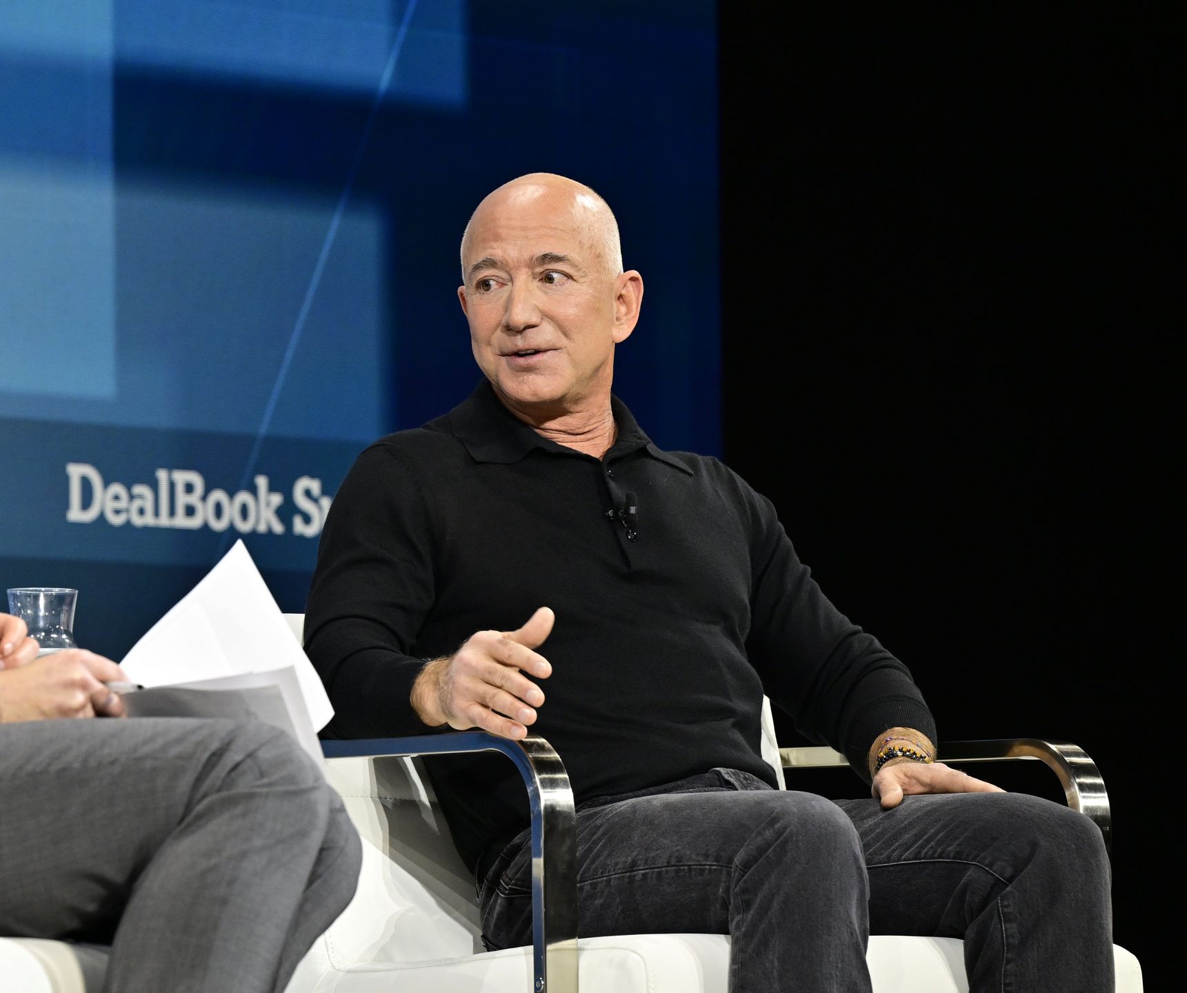 NEW YORK, NEW YORK - DECEMBER 04: Jeff Bezos speaks onstage during The New York Times Dealbook Summit 2024 at Jazz at Lincoln Center on December 04, 2024 in New York City.  (Photo by Eugene Gologursky/Getty Images for The New York Times)