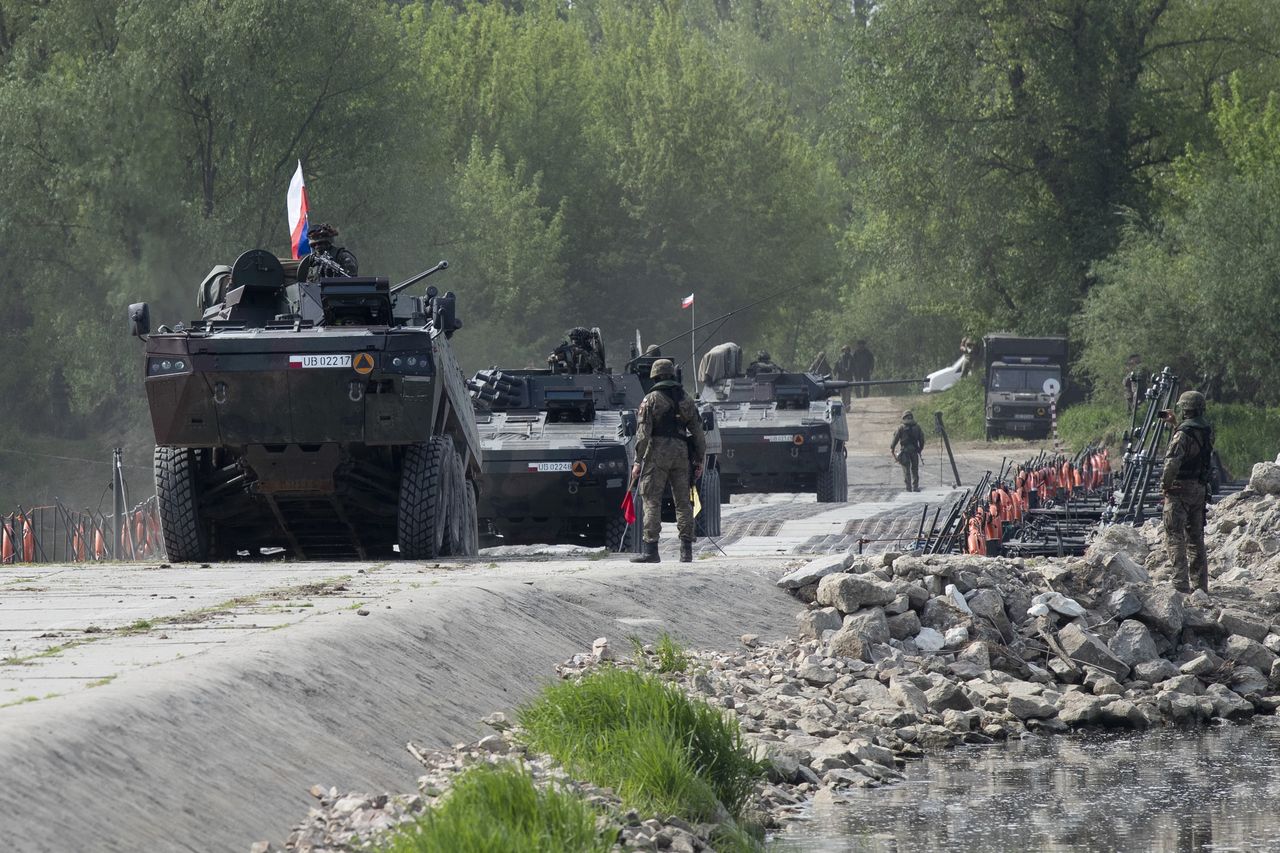 NATO military exercises codenamed Defender-Europe 2022. Soldiers from Poland, USA, Sweden, and France during the crossing of the Vistula.