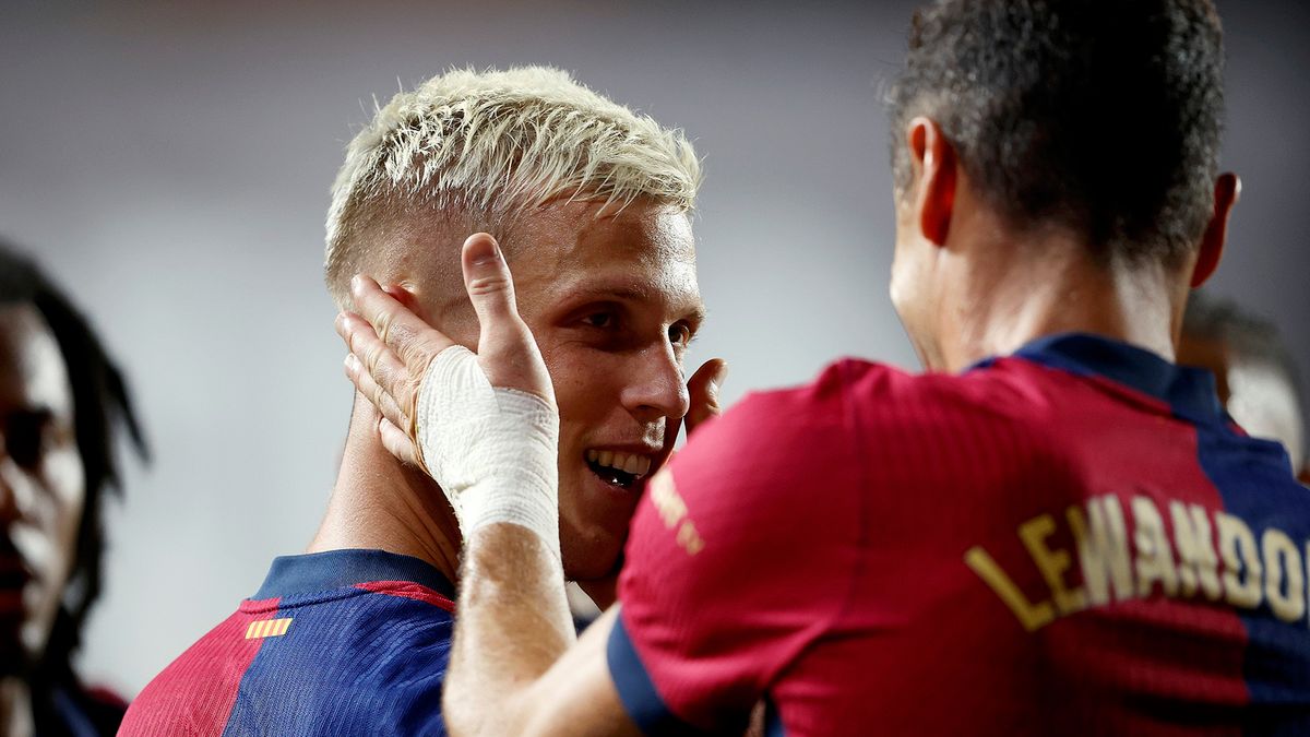 Getty Images / Rico Brouwer/Soccrates / Na zdjęciu: Dani Olmo i Robert Lewandowski