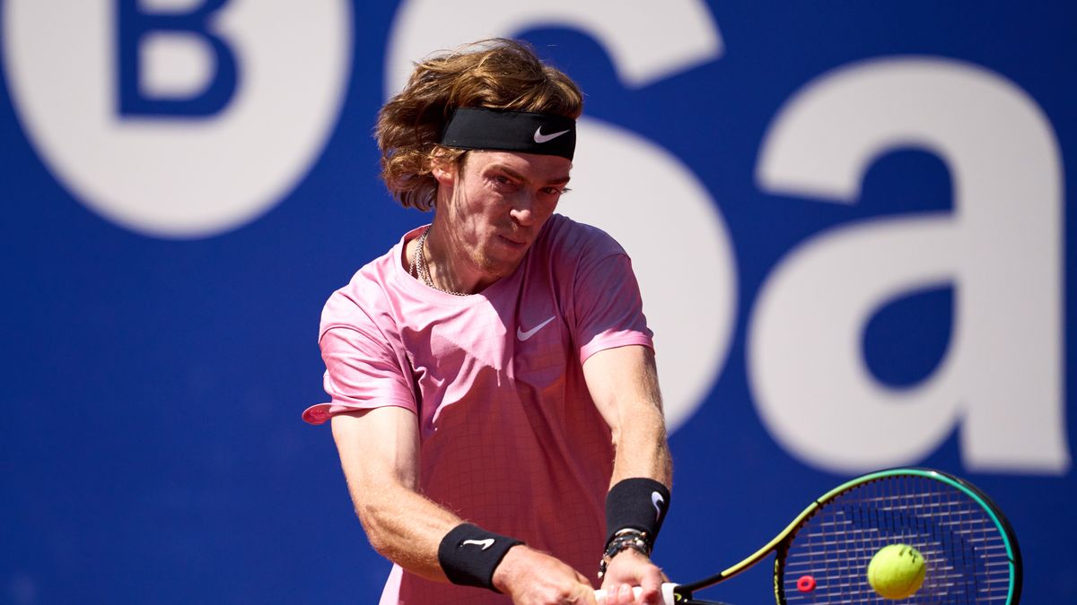 BARCELONA, SPAIN - APRIL 23: Andrey Rublev of Russia plays a backhand against Jannik Sinner of Italy in their quarter-final match during day five of the Barcelona Open Banc Sabadell 2021 at Real Club de Tenis Barcelona on April 23, 2021 in Barcelona, Spain. (Photo by Alex Caparros/Getty Images)