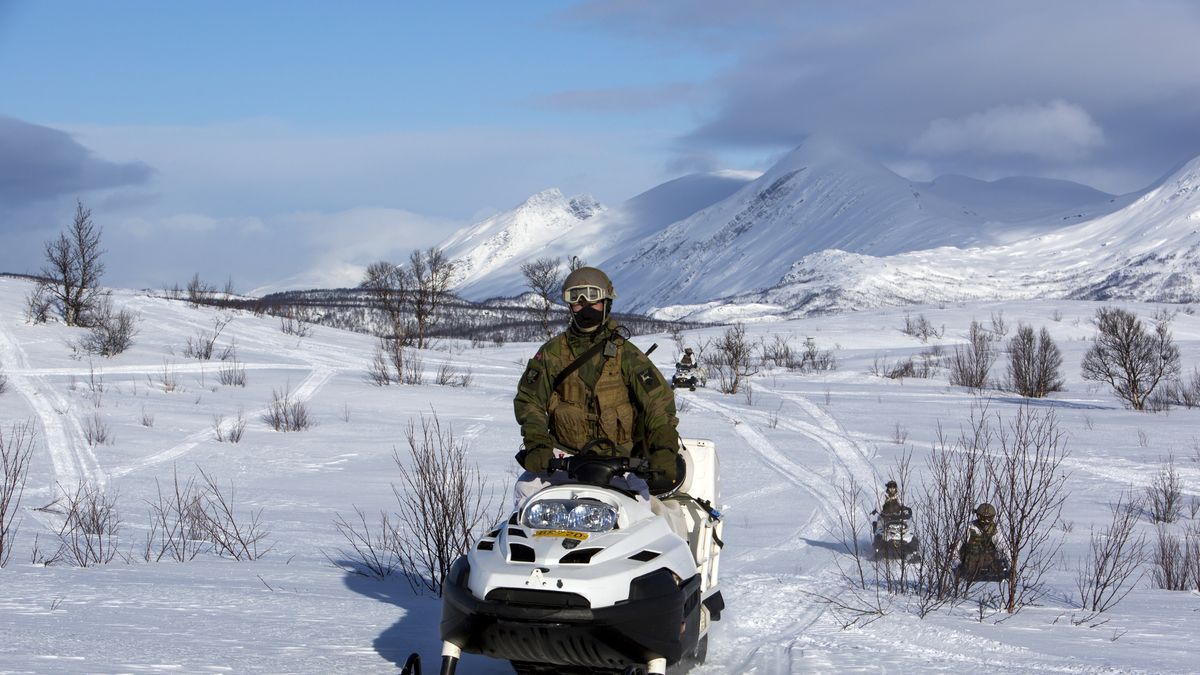 Norwegian Army Train In The Arctic Circle
SKJOLD, NORWAY - MARCH 6: Norwegian army soldiers use snowmobiles for mobility during a live fire exercise March 6, 2013  in Skjold, Norway. White camouflage uniforms do not completely help soldiers to blend into the snow. Their breath may give them away while holding a position in the snow. Ballistics and electronic devices function differently in extreme cold. (Photo by Robert Nickelsberg/Getty Images)
Robert Nickelsberg
Arctic Circle, Army, Aviation, Battle, Camoflage, Defence, Environment, Evacuation, Exercise, Extreme, Global Warming, Helicopter, Instruction, Invasion, Land, Landscape, Map, NATO, Norway, Preparedness, Scandinavia, Security, Simulation, Snow, Snowmobile, Soldier, Soldiers, Survival, Threat, Training, Transport, Transportation, Uniform, Water, Winter Warfare