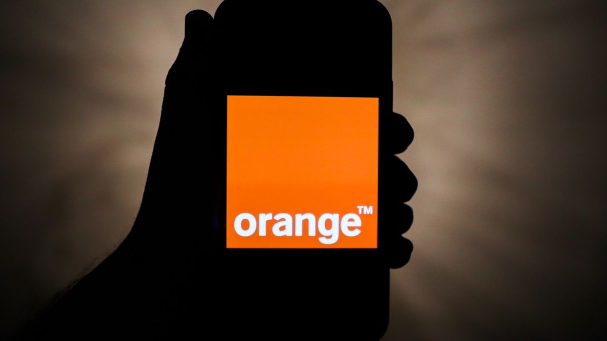 Orange logo is seen displayed on a phone screen in this illustration photo taken in Poland on November 19, 2020. (Photo by Jakub Porzycki/NurPhoto via Getty Images)