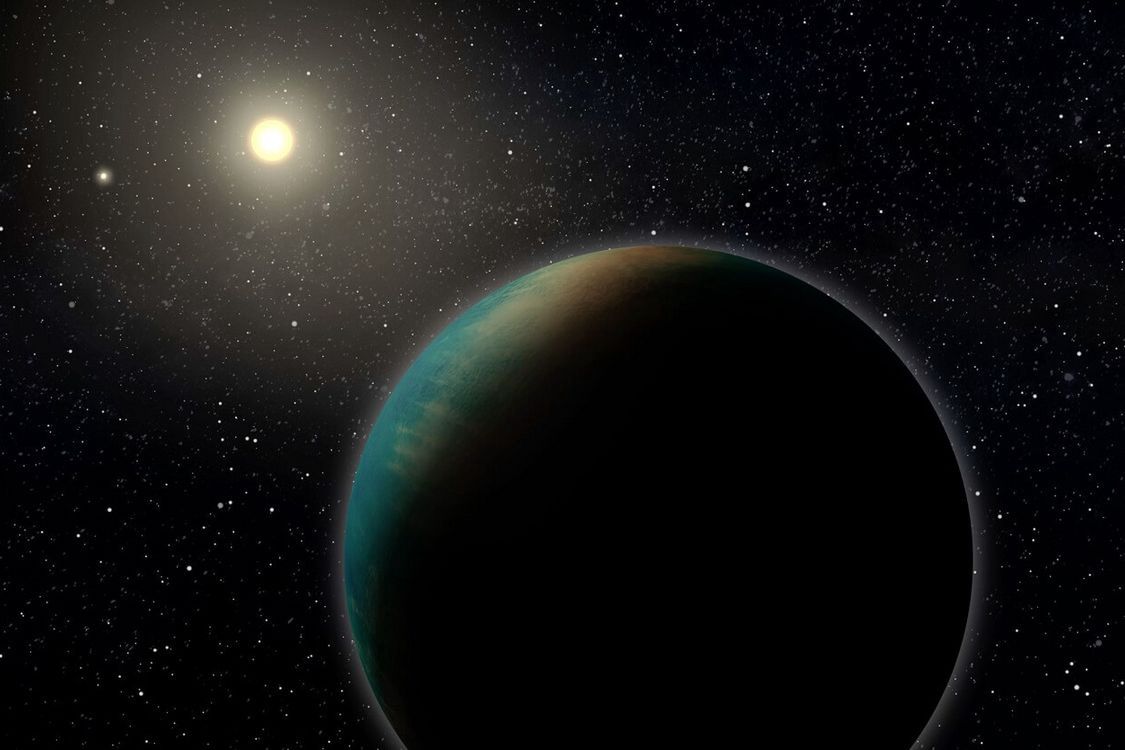 Artystyczny obraz egzoplanety TOI-1452 b, małej planety, która może być w całości pokryta głębokim oceanem.