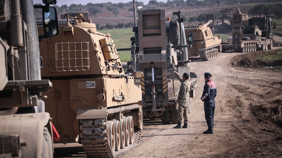 HATAY, TURKEY - FEBRUARY 17: Total of 150 military vehicles of Turkish Armed Forces' pass through Reyhanli district of Turkey's Hatay as they are being deployed to Syria border as reinforcements, including howitzers, tanks, ammunition, armored construction machines and other military vehicles on February 17, 2020. (Photo by Burak Milli/Anadolu Agency via Getty Images)
