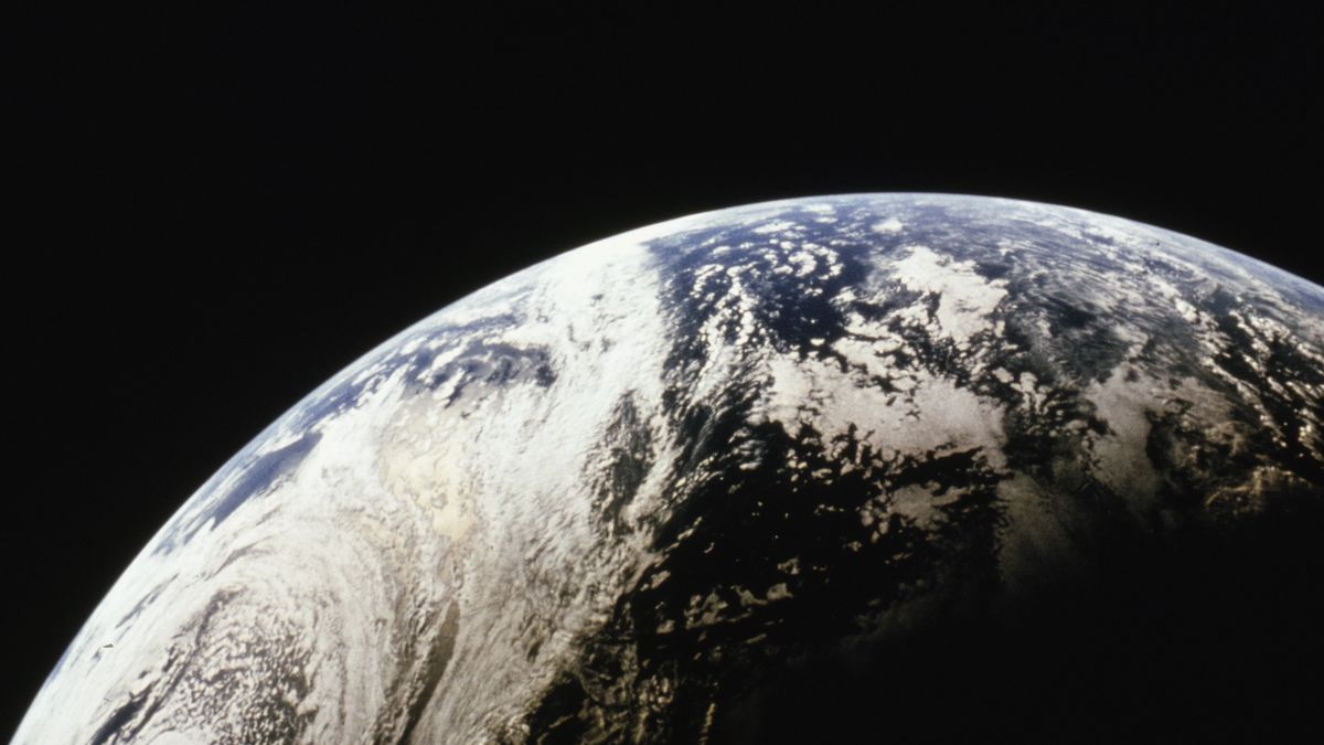 View of Earth from space during the Apollo 4 unmanned orbital test flight, November 9th 1967. The photo was taken through the command pilot's window at an altitude of 9,850 nautical miles. The view is looking south-west over the Atlantic Ocean, with a large low pressure area visible over the South Atlantic between Africa and South America. (Photo by UPI/Bettmann Archive/Getty Images)