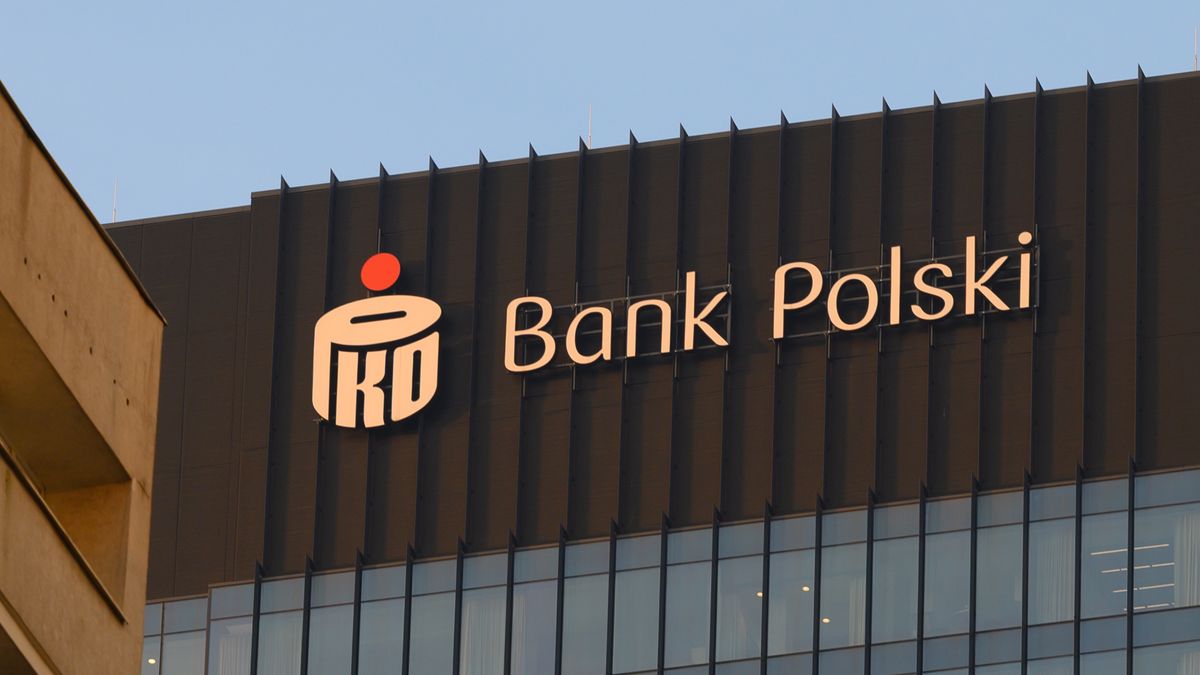 The PKO Bank Polski sign is pictured on the bank's headquarters in Warsaw, Poland, on December 10, 2025. (Photo by Aleksander Kalka/NurPhoto via Getty Images)