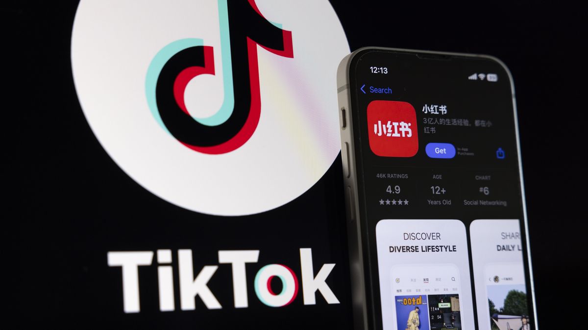 JAPAN - 2025/01/17: In this photo illustration, TikTok alternative app "RedNote" which is also called the Chinese Instagram is seen displayed on a mobile phone. A potential TikTok ban in the USA makes many TikTok users migrate to "Chinese Instagram" social media application RedNote also known as Xiaohongshu or Little Red Book (Red). The RedNote app supports short-form content and is also used as an e-commerce platform. (Photo Illustration by Stanislav Kogiku/SOPA Images/LightRocket via Getty Images)