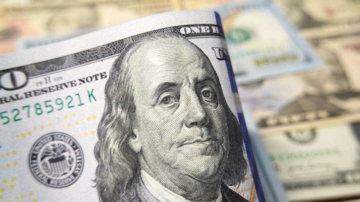 CHINA - 2025/09/02: In this photo illustration, a one-hundred-dollar U.S. bill is displayed among other U.S. banknotes. (Photo Illustration by Sheldon Cooper/SOPA Images/LightRocket via Getty Images)