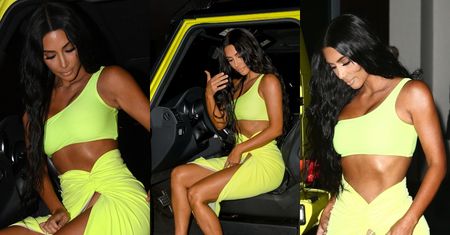 Kim Kardashian próbuje wysiąść jak dama z neonowego samochodu (ZDJĘCIA)