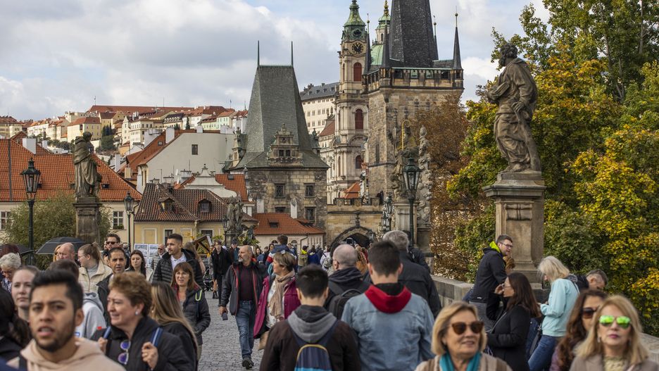 PRAGUE, CZECH REPUBLIC - OCTOBER 04: People enjoy in the heart of Europe; Prague, Czech Republic on October 04, 2022. Prague, which is known with many names such as "City with 100 Towers", "Roof of Europe", "Heart of Europe", "Golden City" and "Mother of Cities", is not only the capital and largest city of the country, but also an attractive tourism center. Czechia's capital, Prague, takes visitors back in time with its photographic appearance. Prague, also known as the "City with 100 Towers," the "Roof of Europe," the "Heart of Europe," the "Golden City," and the "Mother of Cities," is not only the country's capital and largest city, but it is also a favored tourist destination. With its historical bridges, cathedrals, towers with gold tips, and castles, Prague is one of the top ten most visited towns in Europe. The city is also ideal for walking as it is located in a valley split by a river and surrounded by hills. (Photo by Emin Sansar/Anadolu Agency via Getty Images)