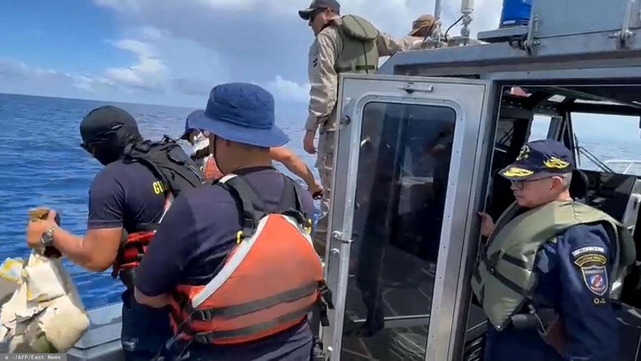 Temporary
Grab taken from a handout video released by Costa Rica's Public Security Ministry showing coastguard officers on a vessel recovering items from the sea following the crash of a small plane off the coast of Costa Rica on the eve, near Limon, on October 22, 2022. - Rescue teams in Costa Rica on Saturday found the bodies of two people who were among six travelling on a small plane that crashed in the Caribbean, officials said. The aircraft was carrying five German passengers and a Swiss pilot on a flight from Mexico when it went down Friday off the coast of Costa Rica. (Photo by Costa Rica's Public Security Ministry / AFP) / RESTRICTED TO EDITORIAL USE - MANDATORY CREDIT "AFP PHOTO / COSTA RICA'S PUBLIC SECURITY MINISTRY" - NO MARKETING - NO ADVERTISING CAMPAIGNS - DISTRIBUTED AS A SERVICE TO CLIENTS
-