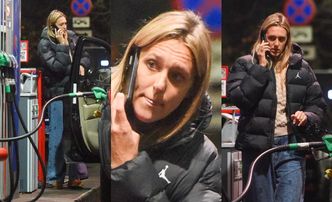 Pozbawiona makijażu Aleksandra Żebrowska tankuje jeepa za 345,99 zł, gawędząc przez telefon (ZDJĘCIA)