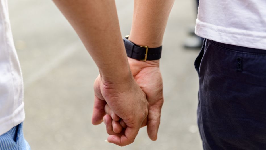 TAIPEI CITY, TAIPEI, TAIWAN - 2019/10/26: Two men walking hand in hand at the 2019 LGBT Pride Parade in Taipei. (Photo by Alberto Buzzola/LightRocket via Getty Images)
