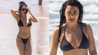 Charli XCX relaksuje się na australijskiej plaży, paradując w czarnym bikini