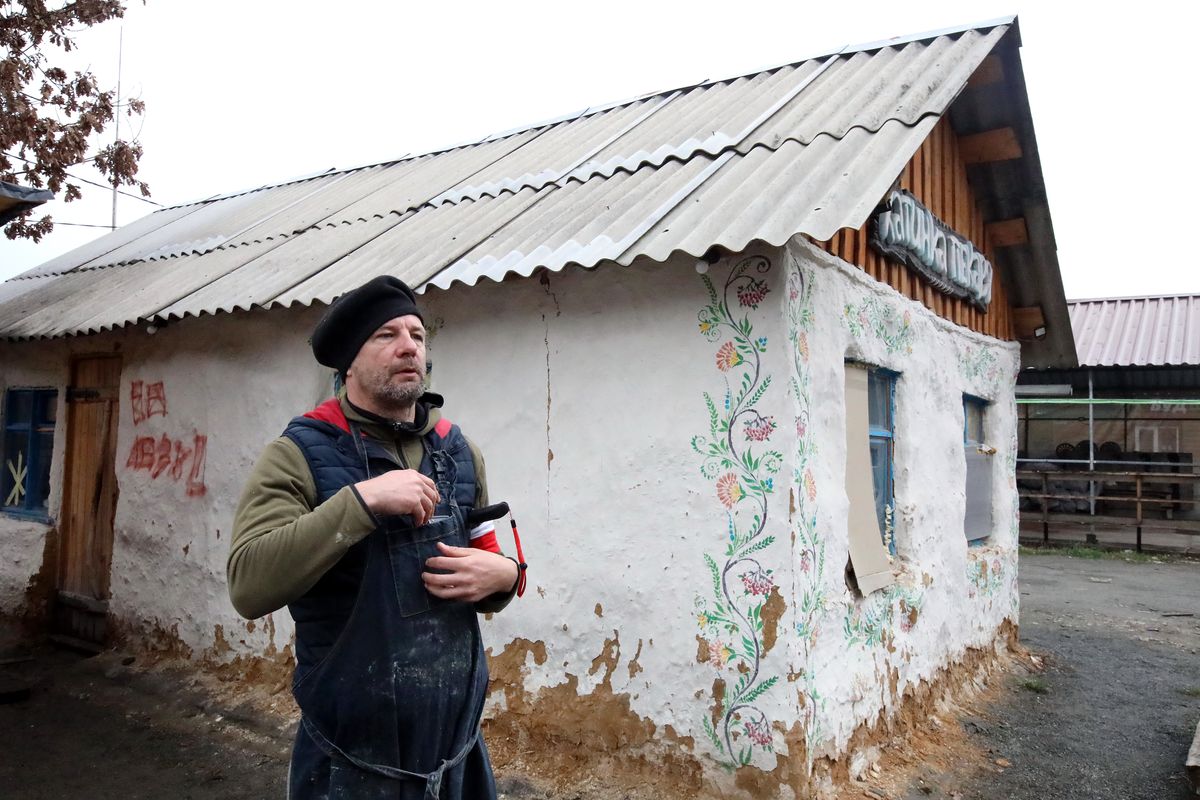 BUCHA, UKRAINE - APRIL 21, 2022 - Polish volunteer, owner of a craft bakery in Poznan Jacek Polewski, who came to Bucha to bake bread for local residents and military personnel, is pictured at the Khatynka pekaria (Baker's Hut) craft bakery, Bucha, Kyiv Region, northern Ukraine. (Photo credit should read Volodymyr Tarasov/ Ukrinform/Future Publishing via Getty Images)