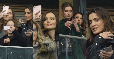 WAGs podziwiają siebie przez telefony komórkowe na meczu Polska-Urugwaj... (ZDJĘCIA)