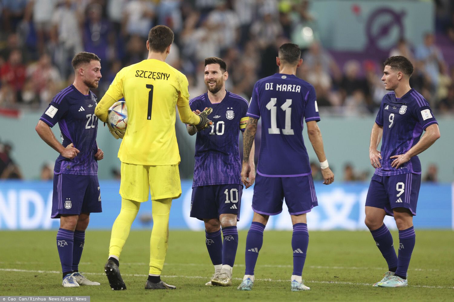 (221130) -- DOHA, Nov. 30, 2022 (Xinhua) -- Lionel Messi (3rd L) of Argentina claps hands with Poland's goalkeeper Wojciech Szczesny (2nd L) before making a penalty kick during their Group C match at the 2022 FIFA World Cup at Stadium 974 in Doha, Qatar, Nov. 30, 2022. (Xinhua/Cao Can)
