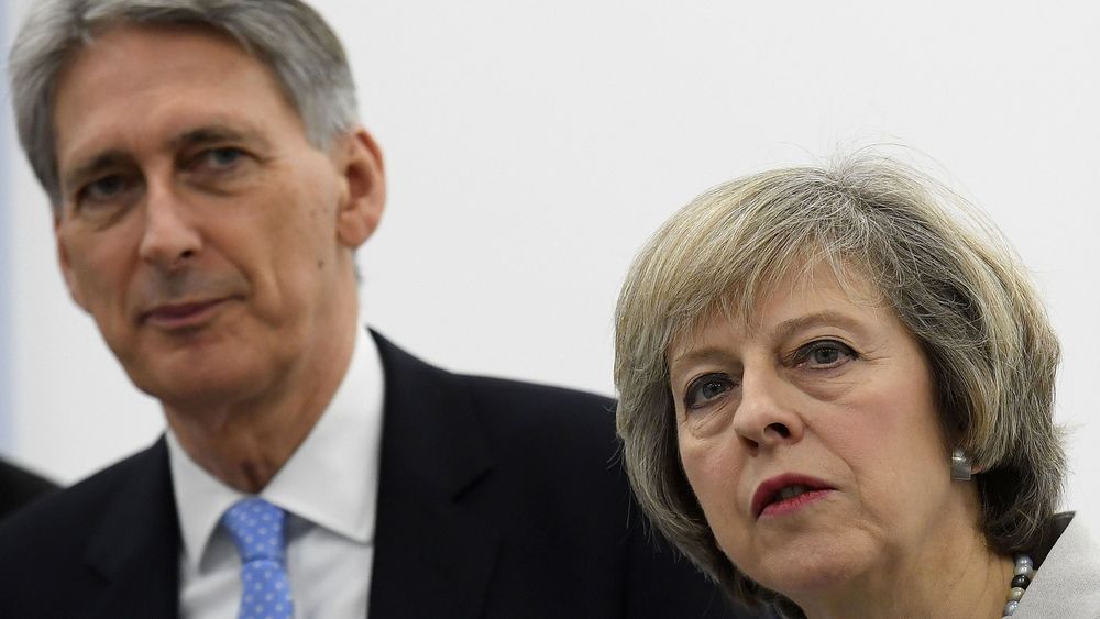 Kanclerz Philip Hammond i premier Theresa May