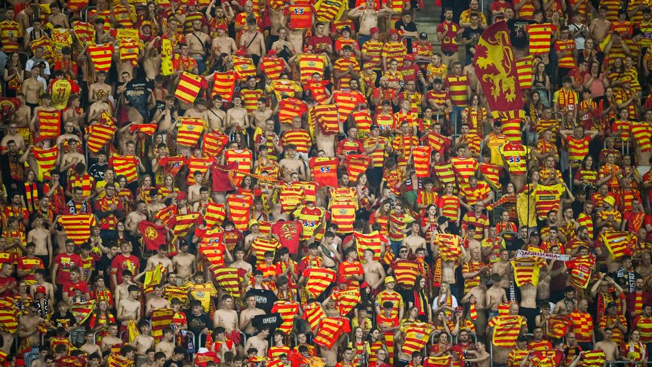 BIALYSTOK, POLAND - APRIL 17: Fans of Jagiellonia seen on the tribune during the UEFA Conference League 2024/25 Quarter Final Second Leg match between Jagiellonia Bialystok and Real Betis Balompie at Stadion Miejski w Bialymstoku on April 17, 2025 in Bialystok, Poland. (Photo by Mateusz Slodkowski - UEFA/UEFA via Getty Images)