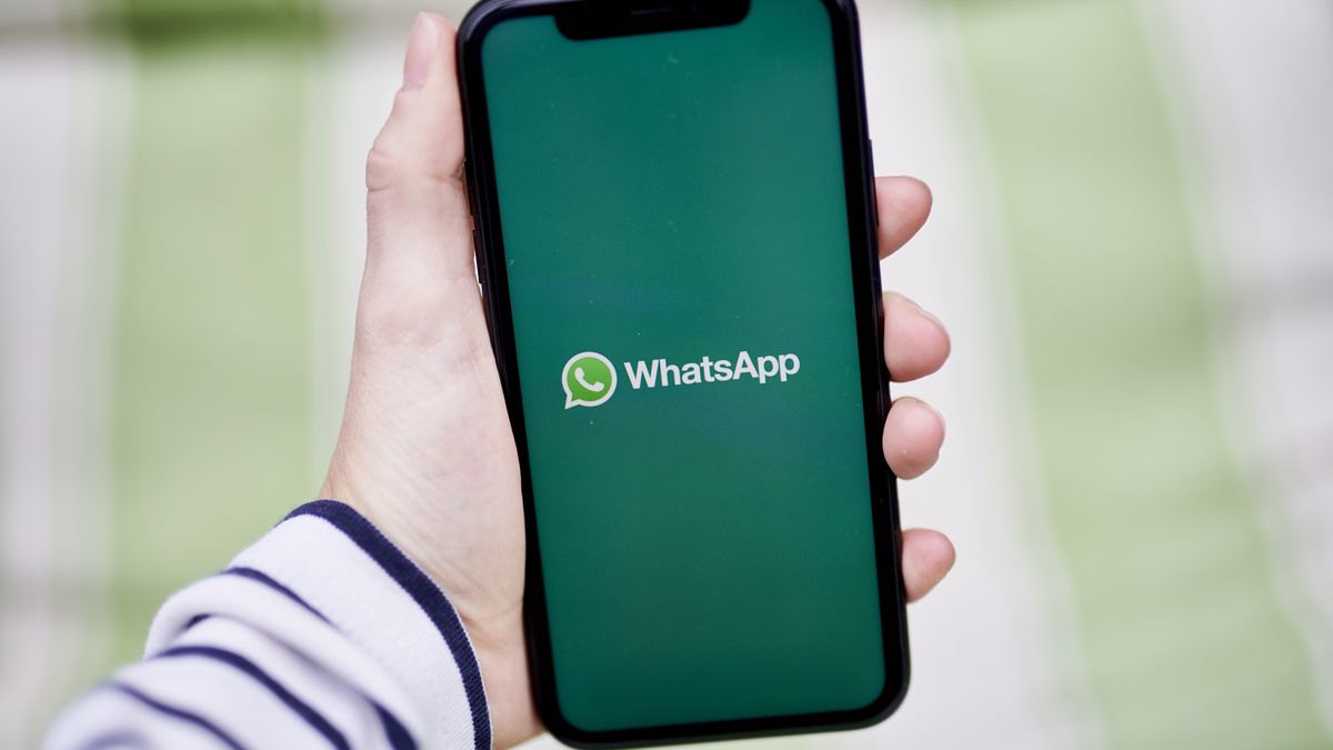 The Facebook Inc. WhatsApp logo on a smartphone arranged in the Brooklyn Borough of New York, U.S., on Tuesday, Oct. 5, 2021. Signal and Telegram, two private messenger apps, saw downloads and user sign-ups soar during the extended downtime of Facebook Inc.s network of apps and services. Photographer: Gabby Jones/Bloomberg via Getty Images