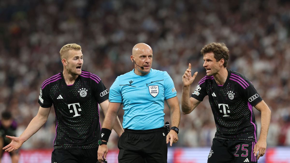 Getty Images / Alexander Hassenstein / Na zdjęciu: Szymon Marciniak (C), Matthijs de Ligt (L), Thomas Mueller