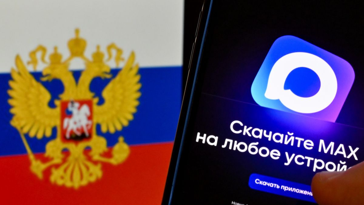 MOSCOW, RUSSIA - FEBRUARY 9: In this photo illustration the MAX app logo is displayed on a mobile phone screen in front of a Russian flag in Moscow, Russia, on February 9, 2026. As Russiaâs economic transformation after the Ukraine war and sanctions extends into the online world, the Kremlin is building a digital ecosystem disconnected from Western-based internet networks. The domestically developed MAX app, launched recently in the country, has begun spreading rapidly, especially across public institutions. MAX is reported to have reached more than 70 million users. (Photo by Sefa Karacan/Anadolu via Getty Images)