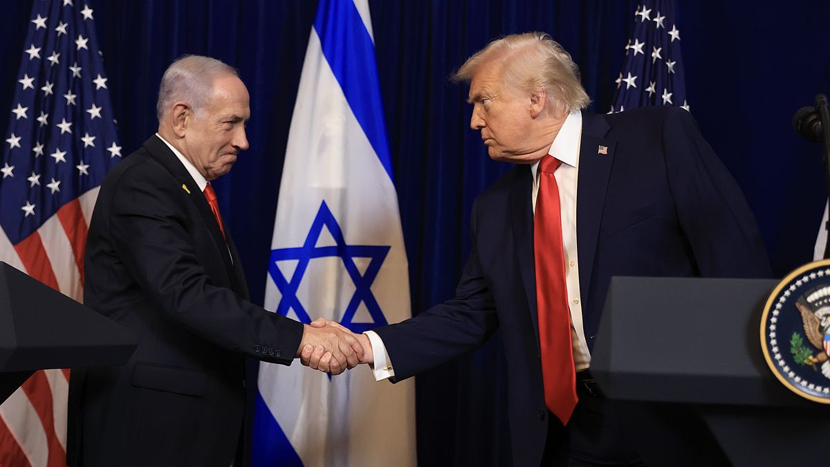 PALM BEACH, FLORIDA - DECEMBER 29: U.S. President Donald Trump shakes hands with Israeli Prime Minister Benjamin Netanyahu during a press conference at his Mar-a-Lago club on December 29, 2025 in Palm Beach, Florida. The two leaders held a bilateral meeting to discuss regional security in the Middle East as well as the U.S.-Israel partnership.  (Photo by Joe Raedle/Getty Images)