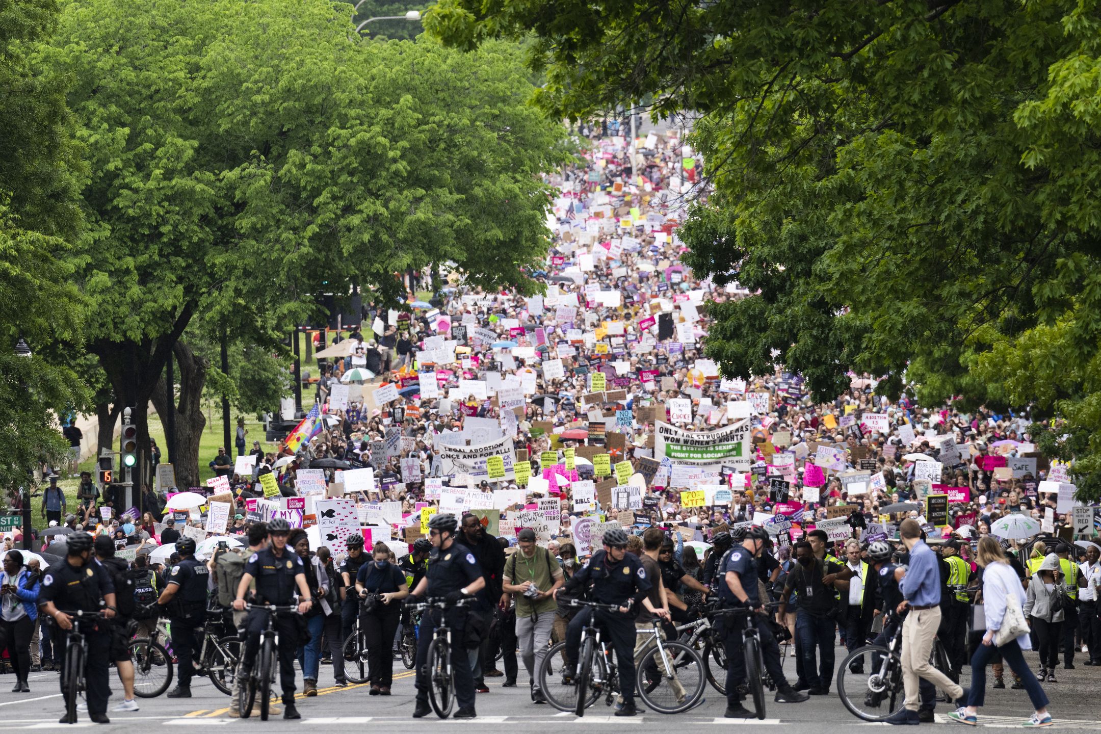UNITED STATES - MAY 14: Demonstrators are seen on Constitution Avenue during a march for abortion rights in response to the Supreme Courts leaked draft opinion indicating the Court will overturn Roe v. Wade, on Saturday, May 14, 2022. (Tom Williams/CQ-Roll Call, Inc via Getty Images)