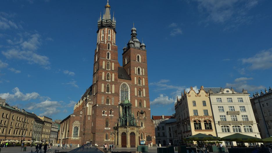 A view of St. Mary's Basilica in a quite empty Krakow's Main Market Square, usually packed with tourists.Krakow and other Polish citiesparticipating in the #CityWillWait campaign are no longer waiting and are ready for the safe reception of returning tourists. The action will becontinue under the slogans #CityIsReady and #We'reReady.On Tuesday, June 2, 2020, in Krakow, Poland. (Photo by Artur Widak/NurPhoto via Getty Images)