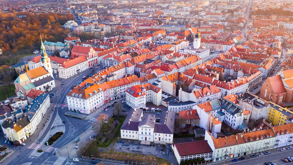 Panoramic view from the drone on the city Kalisz.Panoramic view from the drone on the city Kalisz. Polandtop, city, scene, outdoors, drone, aerial, poland, european, architecture, exterior, landmark, nobody, kalisz, ordinary, red, sky, spring, place, aerial, europe, panorama, skyline, residential, above, landscape, houses, square, travel, downtown, old, traditional, view, polish, day, republic, temple, march, sunny, roof, view, historical, urban, town, top, city, scene, outdoors, drone, aerial, poland, european, architecture, exterior, landmark, nobody, kalisz, ordinary, red, sky, spring, place, europe, panorama, skyline, residential, above, landscape, houses, square, travel, downtown, old, traditional, view, polish, day, republic, temple, march, sunny, roof, historical, urban, town