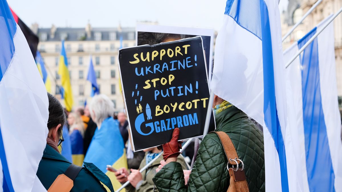 A sign calling for a boycott of Gazprom, in Paris, France, on April 13, 2022. (Photo by Vincent Koebel/NurPhoto via Getty Images)
