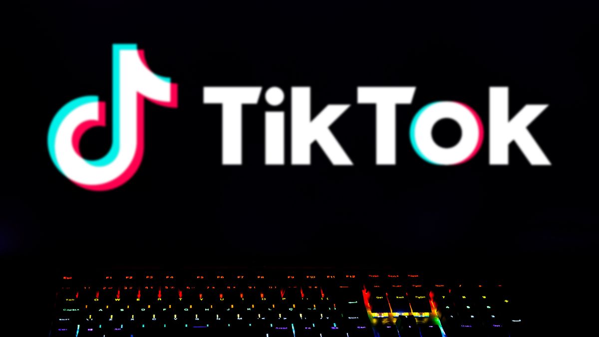 BRAZIL - 2024/04/17: In this photo illustration, the TikTok logo is displayed on the computer screen with a keyboard of colored lights. (Photo Illustration by Rafael Henrique/SOPA Images/LightRocket via Getty Images)