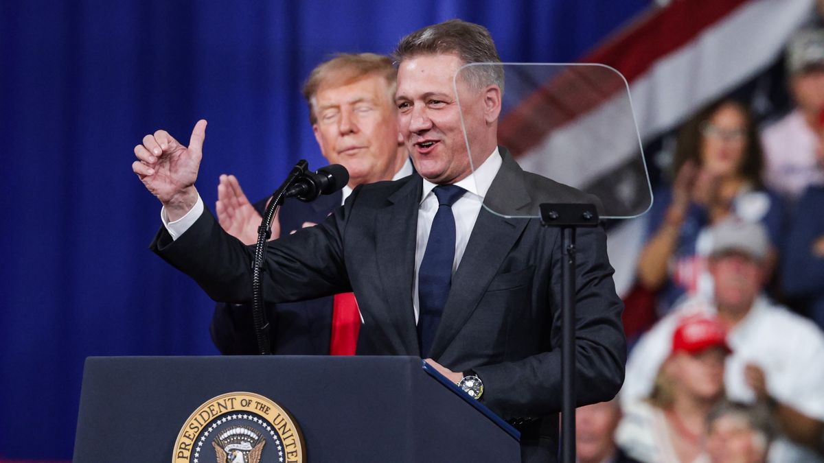 PERRY, GEORGIA - OCTOBER 24: Audi AG CEO Gernot Dollner speaks alongside U.S. President Donald Trump during a midterm campaign rally at the Guardian Centers on October 24, 2026 in Perry, Georgia. Trump is speaking at a rally in support of Georgia Republican Senate candidate, Rep. Mike Collins (R-GA), who is trying to unseat the incumbent U.S. Sen. Jon Ossoff (D-GA), and Georgia Republican gubernatorial candidate Rick Jackson. (Photo by Alex Wong/Getty Images)