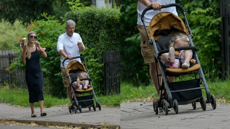 Joanna Krupa z kawą i smartfonem w ręce oprowadza męża i córeczkę po Warszawie
