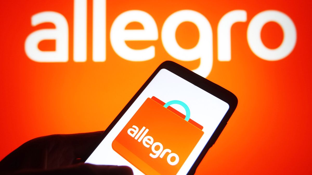 UKRAINE - 2021/11/10: In this photo illustration, an Allegro logo of an online e-commerce platform is seen on a smartphone and a pc screen. (Photo Illustration by Pavlo Gonchar/SOPA Images/LightRocket via Getty Images)