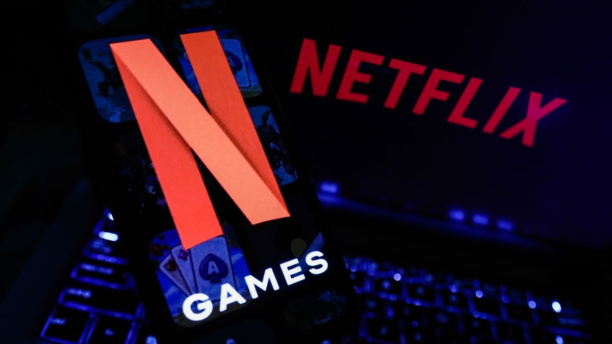 Netflix Games logo displayed on a phone screen and Netflix logo displayed on a laptop screen are seen in this illustration photo taken in Poland on November 4, 2021. (Photo by Jakub Porzycki/NurPhoto via Getty Images)