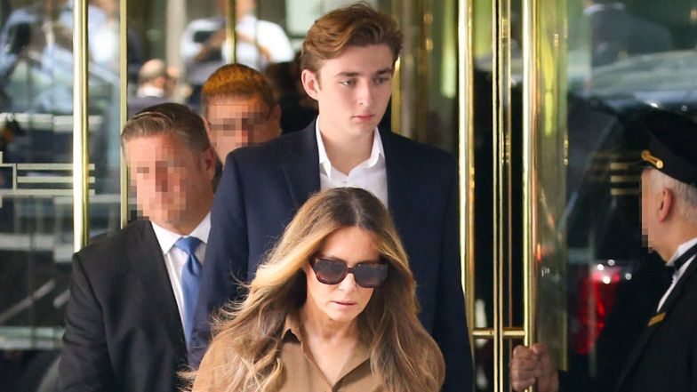 Melania Trump with her son. The price of her handbag is staggering.