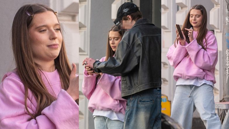 Nicol Pniewska przed sklepem ojca