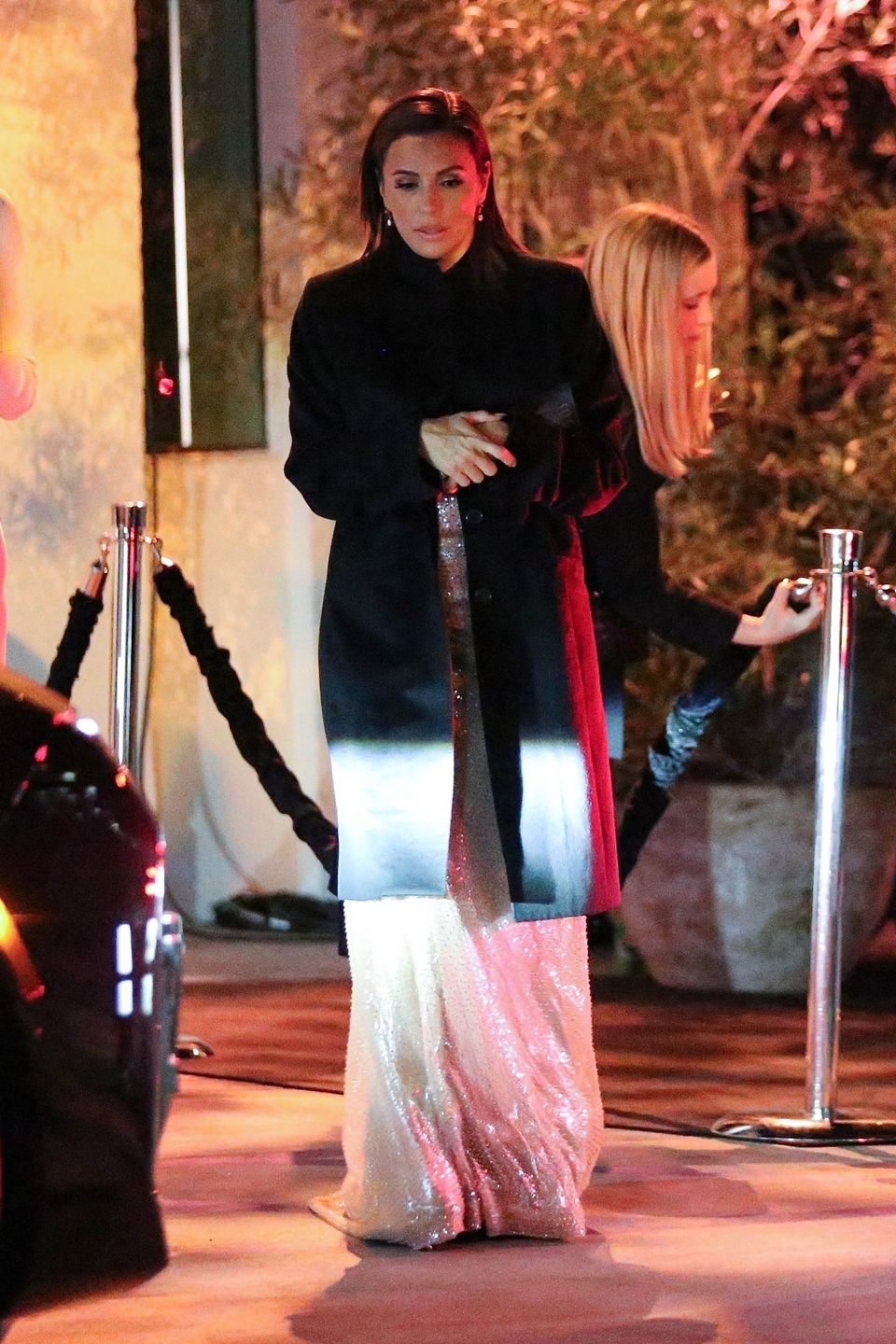 Eva Longoria wraca z imprezy "ELLE" na boso