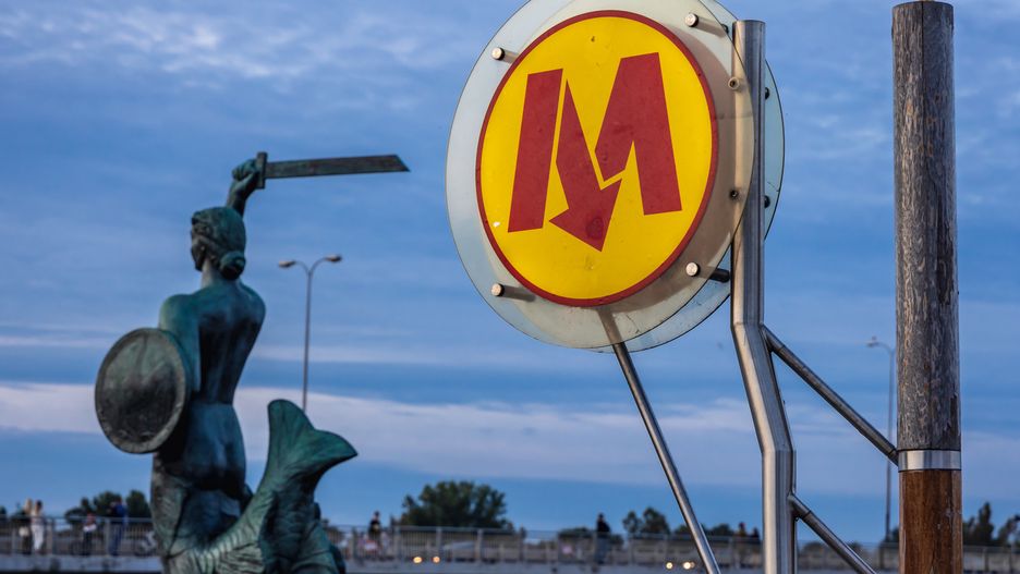 Warsaw, Poland - August 28, 2021: Centrum Nauki Kopernik Metro line 2 sign and Statue of Mermaid in Warsaw city
Konrad Zelazowski
Vistula, River, Warsaw, Poland, Polish, Wisla, Swietokrzyski Bridge, Varsovia, Warszawa, capital, city, urban, bank, riverside, bridge, Most Swietokrzyski, Holy Cross bridge, Vistulan Boulevards, Boulevards, Boulevard, river bank, Mermaid, statue, sculpture, monument, Metro, Subway, transport, transportation, Warsaw Metro, Metro Warszawskie, sign, logo, station, public, entry, Rapid transit, exterior, Line M2, line, M2, Centrum Nauki Kopernik, line 2, line II, vistula, river, warsaw, poland, polish, wisla, swietokrzyski bridge, varsovia, warszawa, capital, city, urban, bank, riverside, bridge, most swietokrzyski, holy cross bridge, vistulan boulevards, boulevards, boulevard, river bank, mermaid, statue, sculpture, monument, metro, subway, transport, transportation, warsaw metro, metro warszawskie, sign, logo, station, public, entry, rapid transit, exterior, line m2, line, m2, centrum nauki kopernik, line 2, line ii