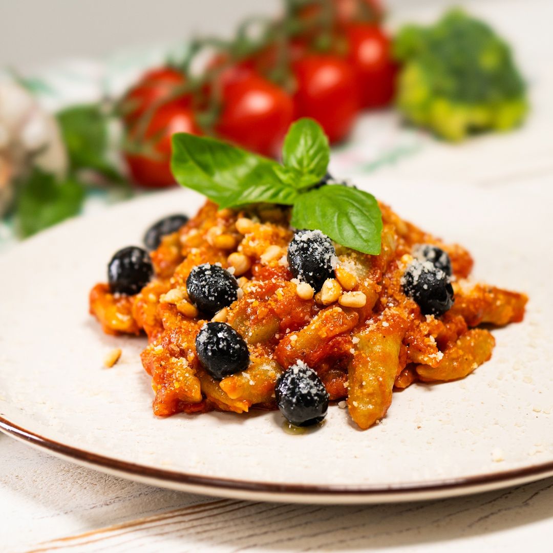 Broccoli dumplings in tomato sauce