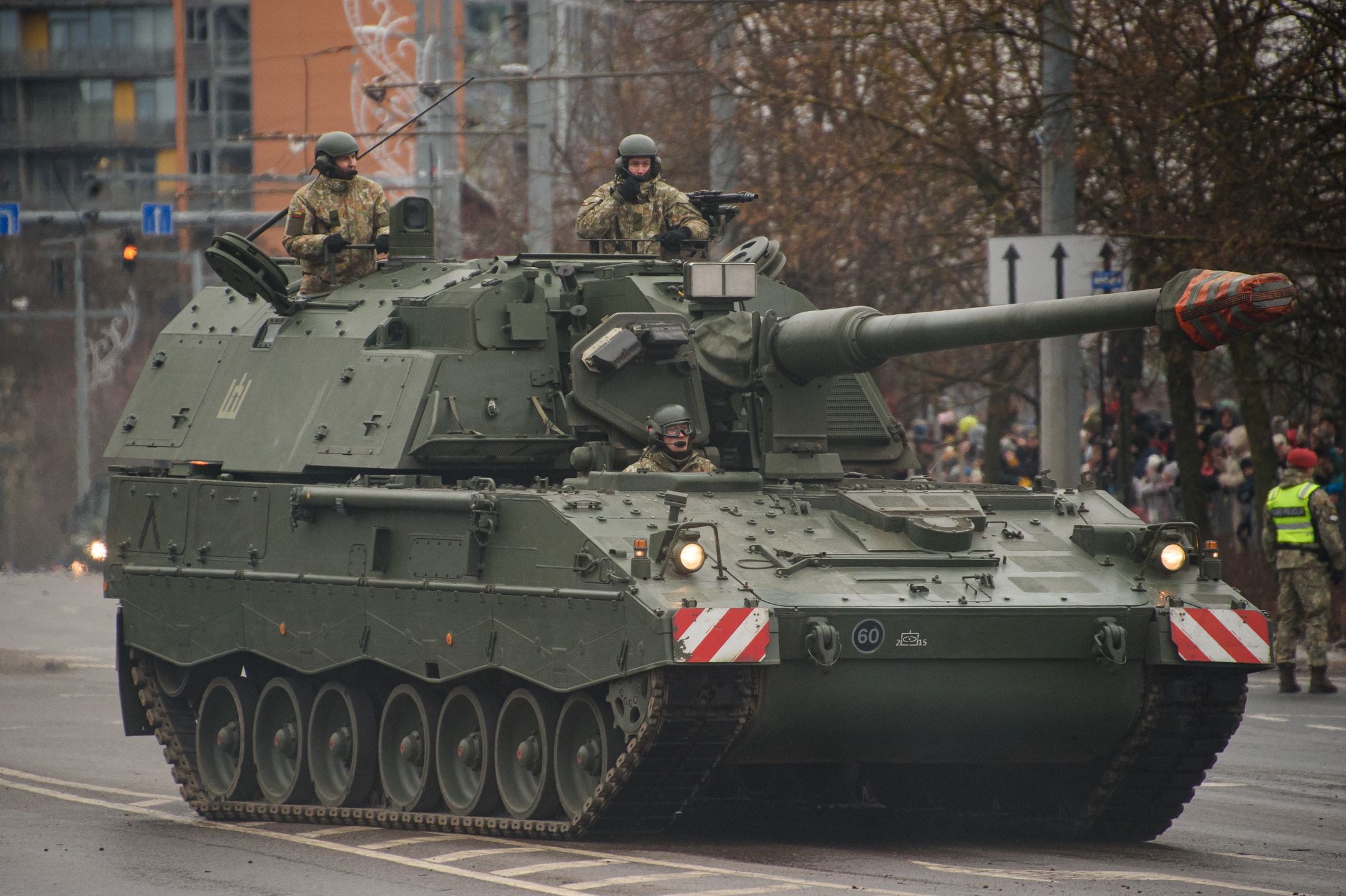 VILNIUS, LITHUANIA - 2023/11/25: Lithuanian army self-propelled howitzers PzH 2000 take part in a military parade during Armed Forces Day in Vilnius. Armed Forces Day honours the restoration of the Lithuania armed forces on November 23, 1918. The military parade commemorating the holiday is being held this year on November 25 in Vilnius. Both Lithuanian military and allies from NATO countries took part in the parade, totaling about 1,400 people and 100 pieces of military equipment. (Photo by Yauhen Yerchak/SOPA Images/LightRocket via Getty Images)