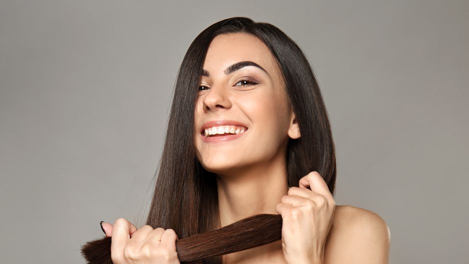 Portrait of beautiful young włosy fryzura pielęgnacja włosów fryzjer fryzjerstwo zdrowe włosy piękne włosy woman with healthy long hair on grey backgroundadult, background, beautiful, beauty, brown, care, caucasian, chestnut, clean, color, coloring, combing, cosmetic, cosmetics, dark, female, girl, grey, hair, healthy, holding, lady, long, mask, natural, people, person, portrait, procedure, shampoo, smooth, straight, strand, strong, therapy, tint, tone, treatment, woman, young, adult, background, beautiful, beauty, brown, care, caucasian, chestnut, clean, color, coloring, combing, cosmetic, cosmetics, dark, female, girl, grey, hair, healthy, holding, lady, long, mask, natural, people, person, portrait, procedure, shampoo, smooth, straight, strand, strong, therapy, tint, tone, treatment, woman, young