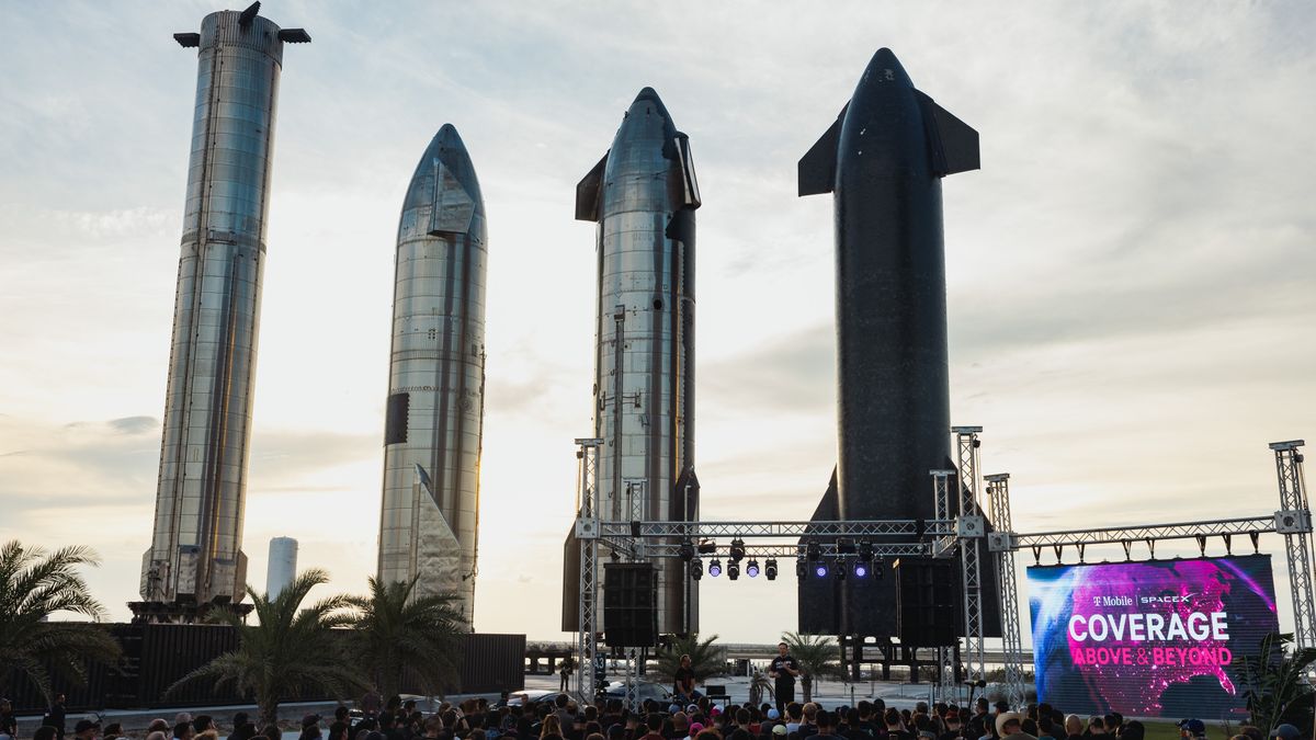 Elon Musk, co-founder and chief executive officer of Space Exploration Technologies Corp. (SpaceX) and Tesla Inc., right, with Mike Sievert, president and chief executive officer of T-Mobile US Inc., during a news conference at the SpaceX Starbase facility in Boca Chica, Texas, US, on Thursday, Aug. 25, 2022. T-Mobile is partnering with Elon Musks SpaceX to offer wireless phone service in remote parts of the US where coverage is spotty. Photographer: Jordan Vonderhaar/Bloomberg via Getty Images