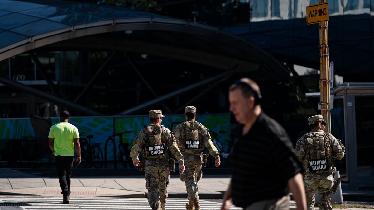 Members of the National Guard near L'Enfant Plaza in Washington, DC, US, on Monday, Oct. 6, 2025. The White House tightened its pressure on congressional Democrats as a US government shutdown lurched into a second week, saying it would give the holdouts another chance to agree to the spending bill before initiating mass firings of federal workers. Photographer: Al Drago/Bloomberg via Getty Images