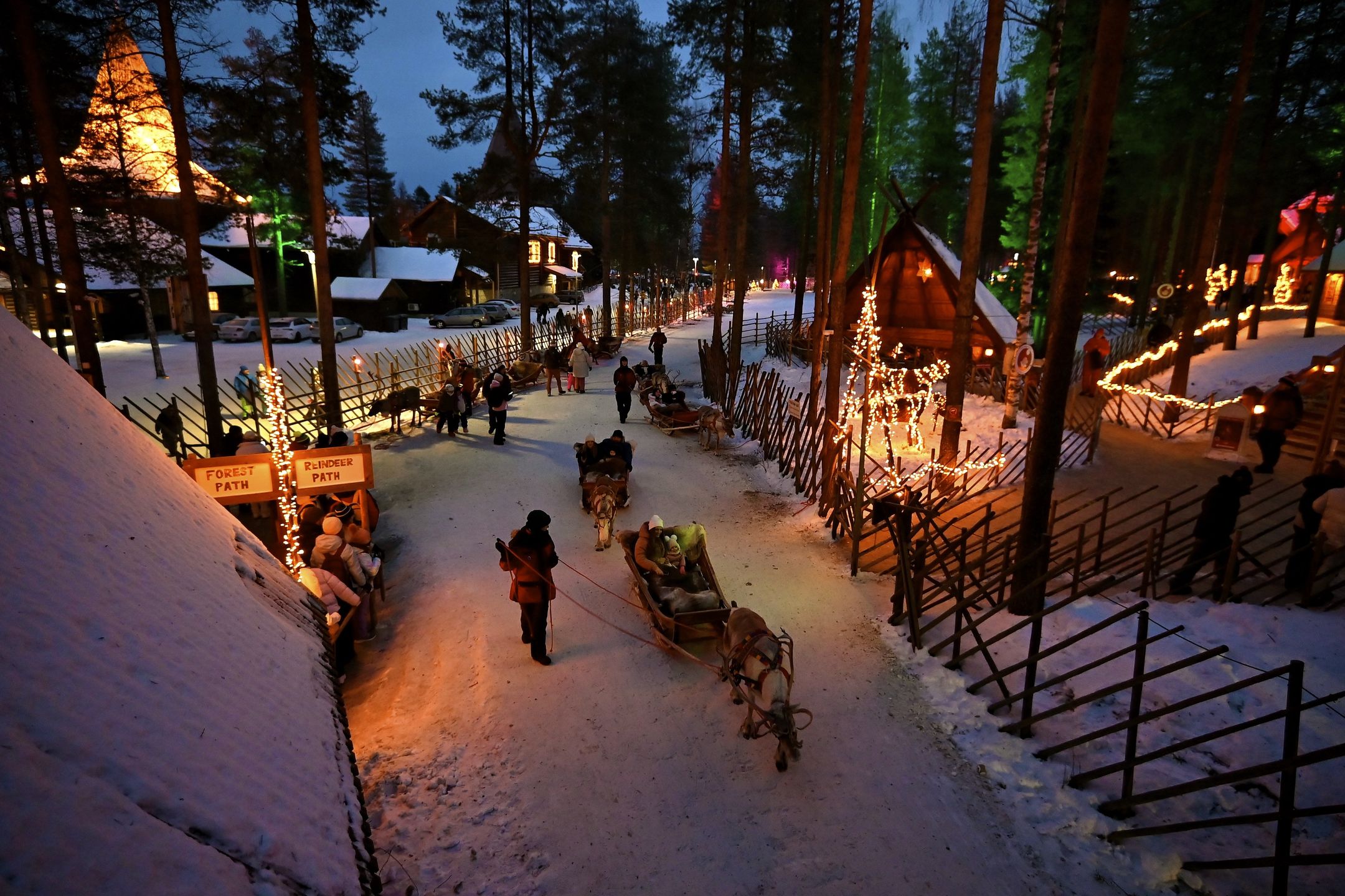 LAPLAND, FINLAND - DECEMBER 31: People spend time at the city center of Rovaniemi, Lapland during the New Year's eve on December 31, 2024 in Finland. (Photo by Alex Nicodim/Anadolu via Getty Images)