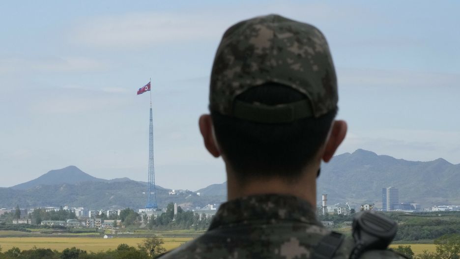 Temporary
A North Korean flag flutters in the wind as a South Korean army soldier stands guard at the border villages of Panmunjom in Paju, South Korea, Tuesday, Oct. 4, 2022. North Korea on Tuesday fired an intermediate-range ballistic missile over Japan for the first time in five years, forcing Japan to issue evacuation notices and suspend trains during the flight of the weapon that is capable of reaching the U.S. territory of Guam. (AP Photo/Ahn Young-joon)
Ahn Young-joon
