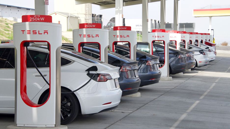 Kettleman City, CA - Jan 29, 2022: Many cars charging at a Tesla Supercharger station. Supercharger stations allow Tesla cars to be fast-charged at the network within a hour.
Sheila Fitzgerald
alternative, american, automobile, automotive, battery, car, charger, charging, ecology, electric, electrical, electricity, empty, energy, environmental, future, green, huge, large, logo, model, modern, motor, network, new, parking, plug, power, recharge, red, sign, sky, sleek, spaces, station, stations, supercharger, technology, tesla, transport, transportation, vehicle, white, Kettleman City, California, ca, tesla, electric, supercharger, parking, station, california, kettleman city, automobile, charger, alternative, american, automotive, battery, car, charging, ecology, electrical, electricity, empty, energy, environmental, future, green, huge, large, logo, model, modern, motor, network, new, plug, power, recharge, red, sign, sky, sleek, spaces, technology, transport, transportation, vehicle, white, ca