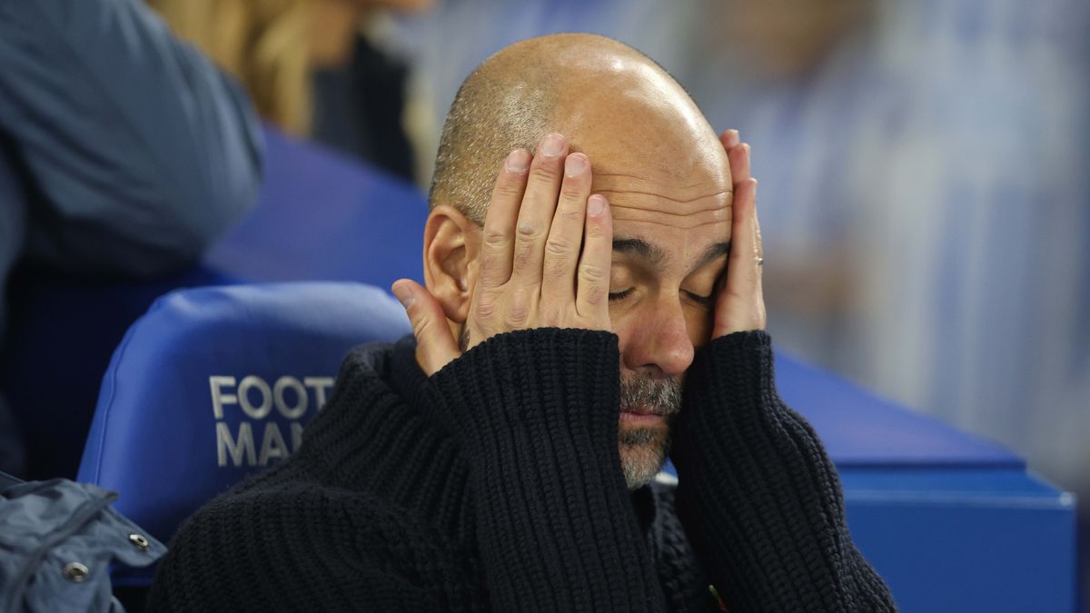BRIGHTON, ENGLAND - NOVEMBER 9: Josep Guardiola Manager of Manchester City looks disappointed & dejected during the Premier League match between Brighton & Hove Albion FC and Manchester City FC at Amex Stadium on November 9, 2024 in Brighton, England. (Photo by Crystal Pix/MB Media/Getty Images)