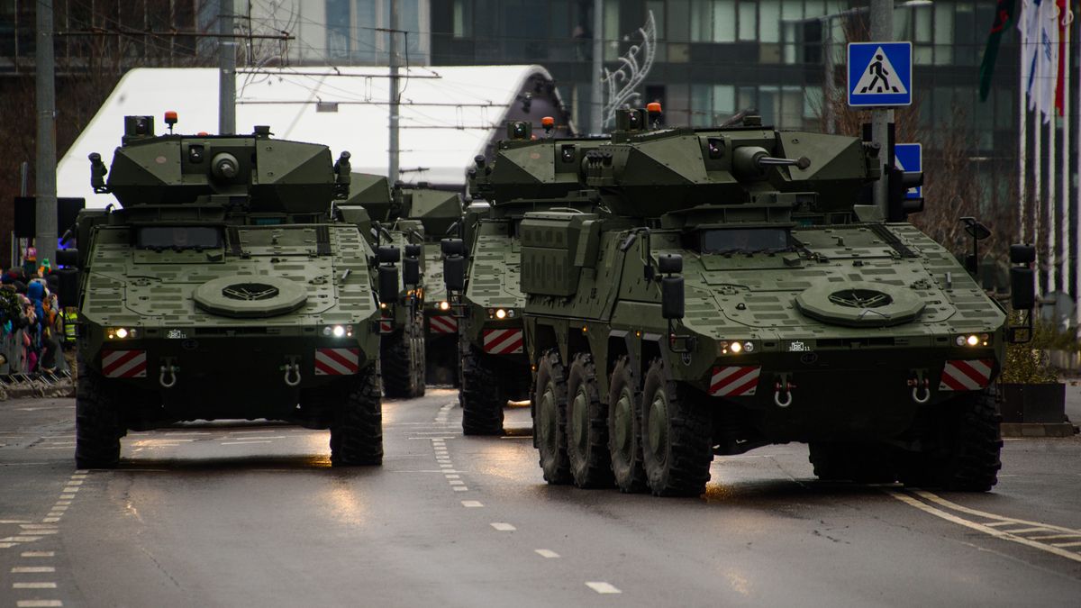 VILNIUS, LITHUANIA - 2023/11/25: Lithuanian infantry fighting vehicles Vilkas (Wolf) take part in a military parade during Armed Forces Day in Vilnius. Armed Forces Day honours the restoration of the Lithuania armed forces on November 23, 1918. The military parade commemorating the holiday is being held this year on November 25 in Vilnius. Both Lithuanian military and allies from NATO countries took part in the parade, totaling about 1,400 people and 100 pieces of military equipment. (Photo by Yauhen Yerchak/SOPA Images/LightRocket via Getty Images)